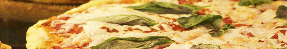 Eating Italian Pizza at Laurel Pizzeria restaurant in Laurel, DE.